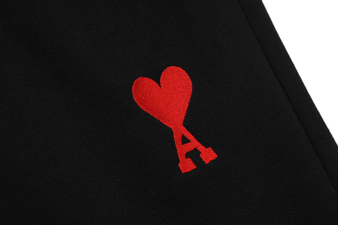 AMI 2026New Arrival Imported machine-embroidered love letter logo, essential for daily commuting for men and women Casual shorts ·Customized milk silk cotton fabric ·Imported machine embroidery technology ·Waist label, hangtag, three wash marks complete Color: Black Sizes: XS S M L
